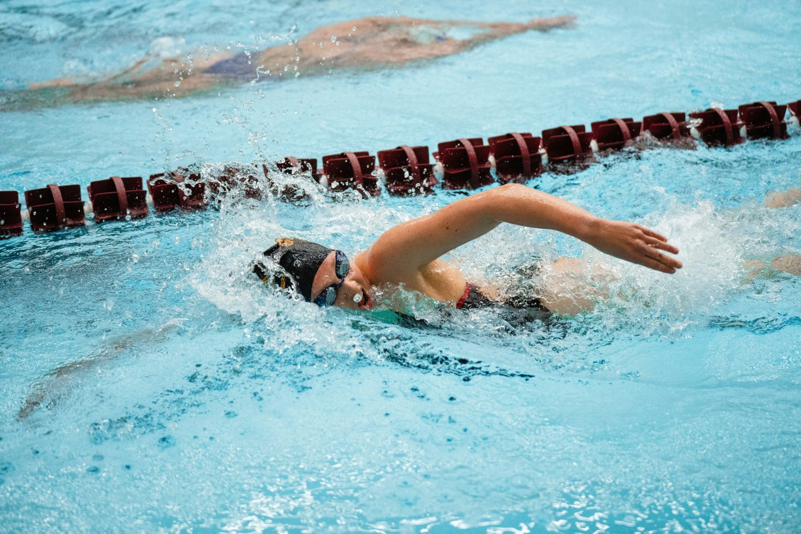 a person swimming in a swimming pool